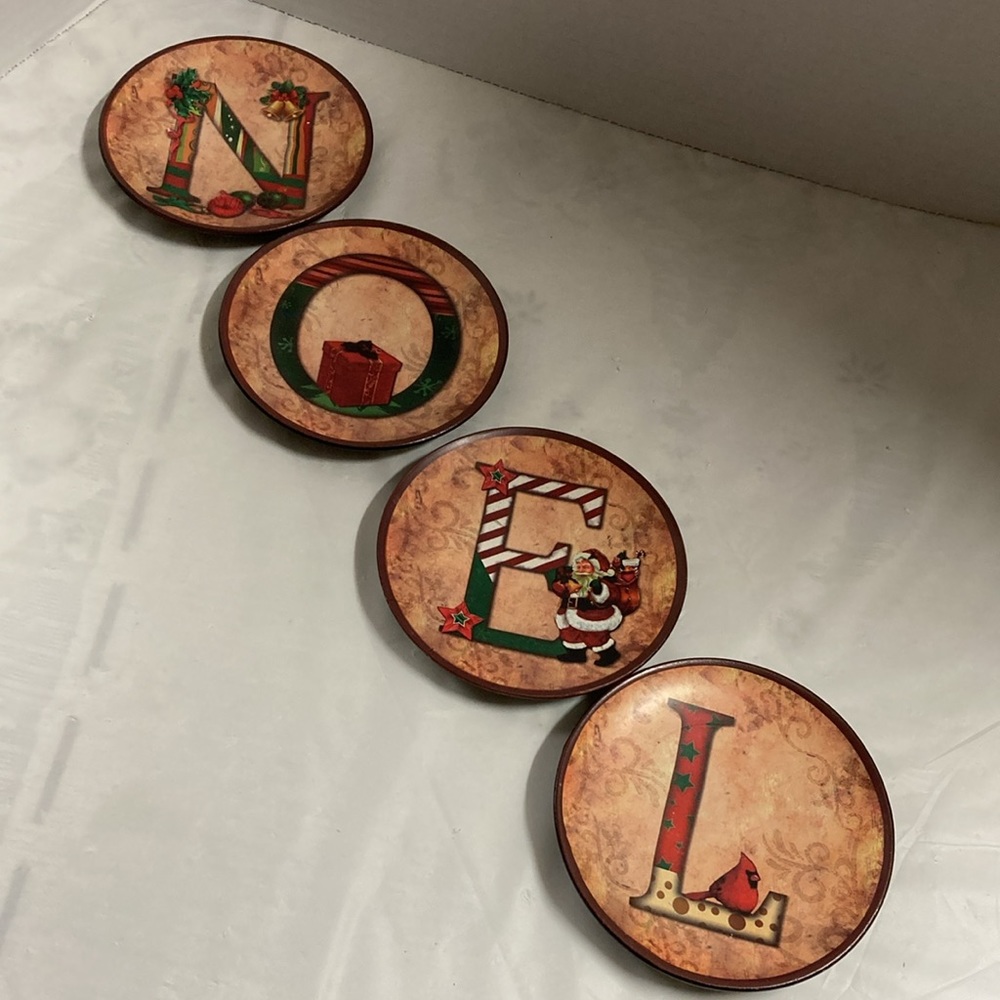 Noel Decoration Plates Coasters Set of 4 Stackable Each Plate has a Letter 4.5”